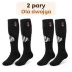 Dwie pary podgrzewanych podkolanówek obok siebie na białym tle